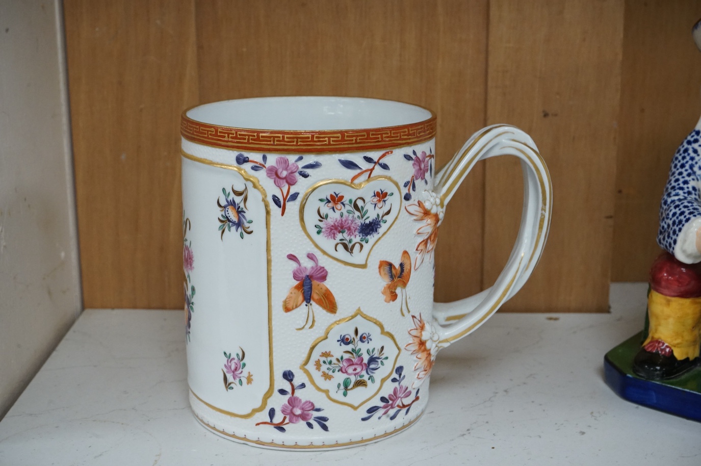 A Samson, Paris mug in Chinese export style and a Copeland Spode toby jug, Samson mug 14.5cm high.
